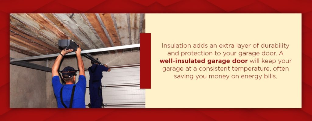 Two men installing insulation in a garage